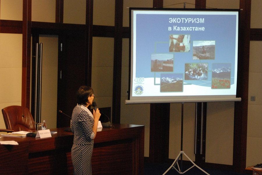 Presenting a talk on ecotourism in Kazakhstan